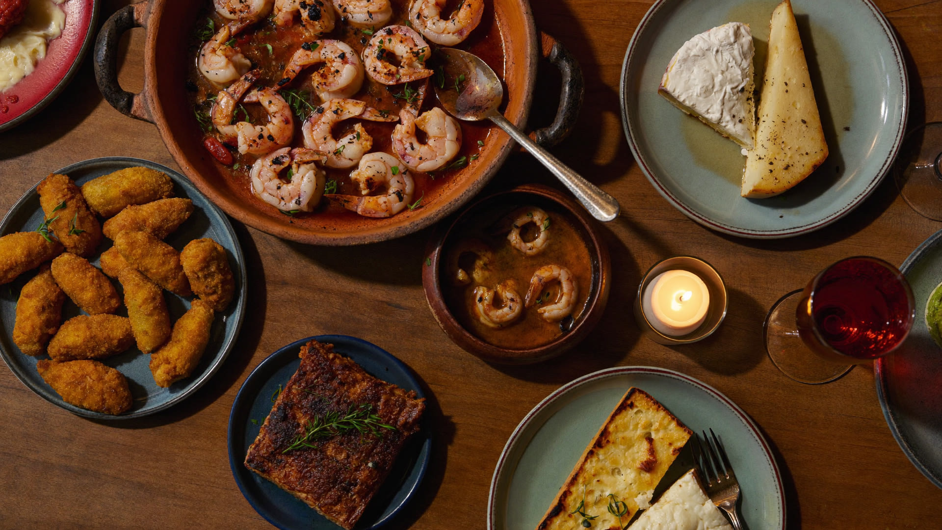 Spanish tapas — croquetas, gambas al ajillo, provoleta at Renzo's Carrollwood